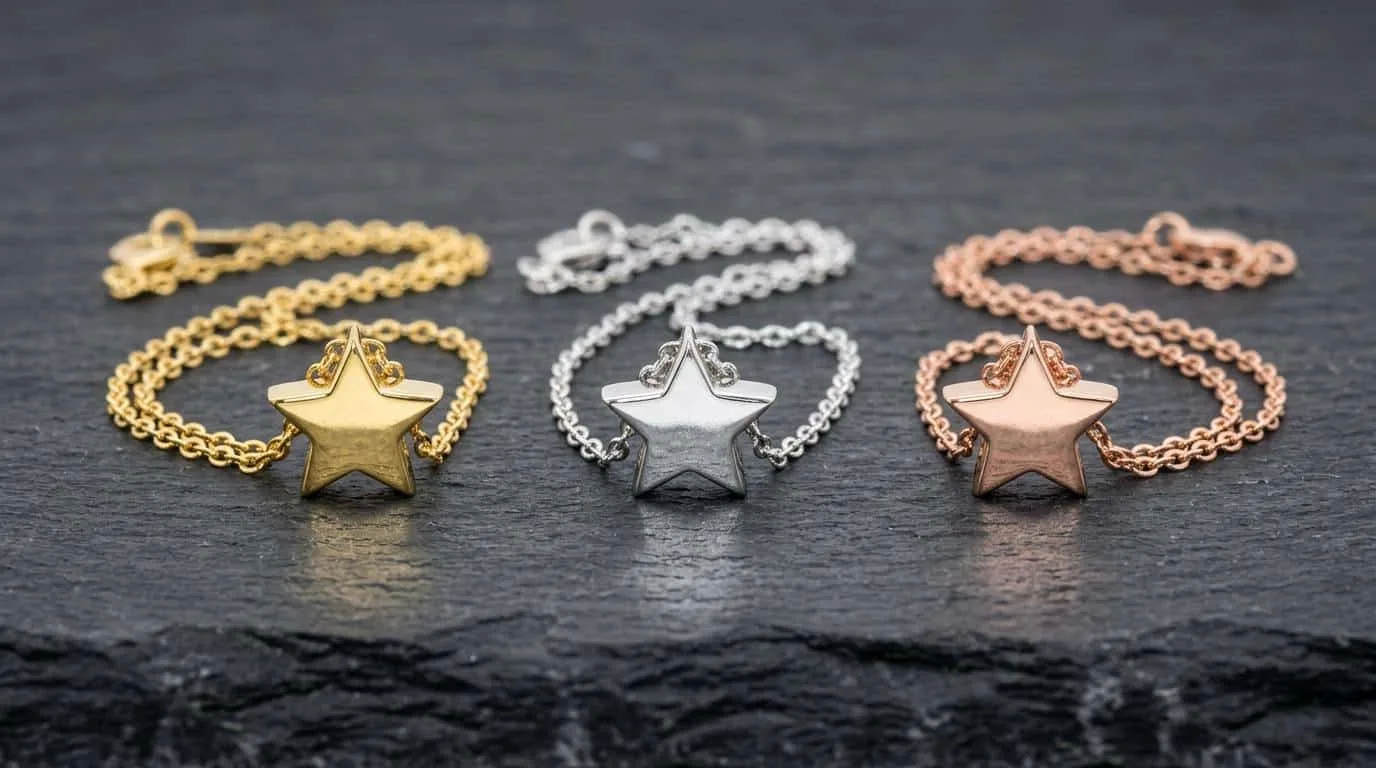 Yellow gold, white gold and rose gold star necklaces side by side — star necklace metal comparison